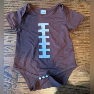 Brown Football-Themed Baby Onesie